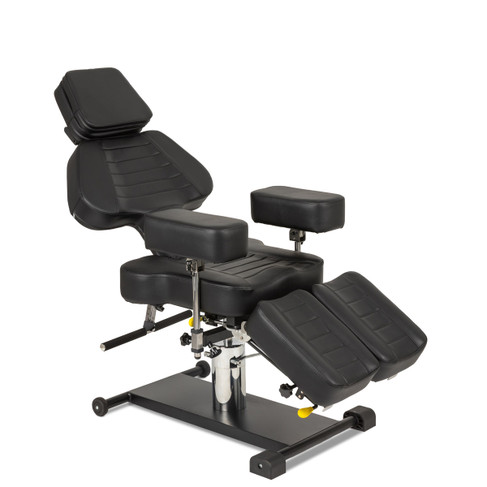 Nova Hydraulic Multifunction Tattoo Chair in Black from three-quarter view to the right with back partially reclined and legs partially extended